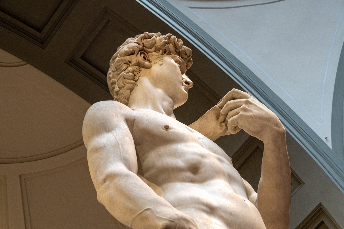 Michelangelo's David in the Accademia Gallery, head and shoulders in close-up.